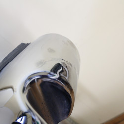 Osłona wydechu chrom Lewa